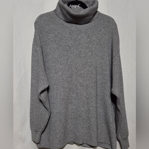 Free People Charcoal Turtleneck Sweater That Looks Like Its Inside Out.